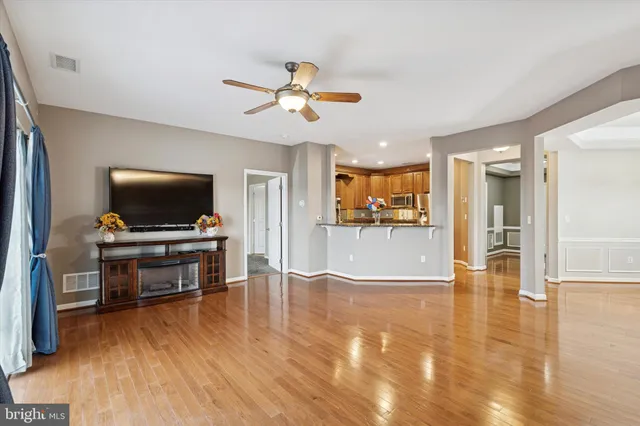 a view of living room with furniture and flat screen tv