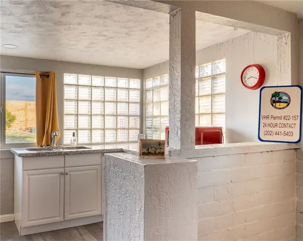 a bathroom with a tub and shower