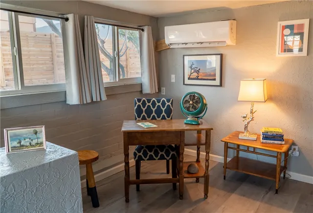 a bathroom with a shower curtain and a sink