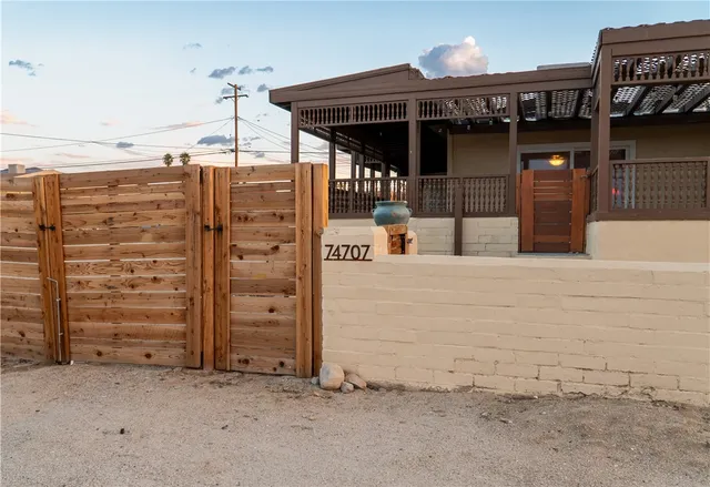 a view of a living room with furniture