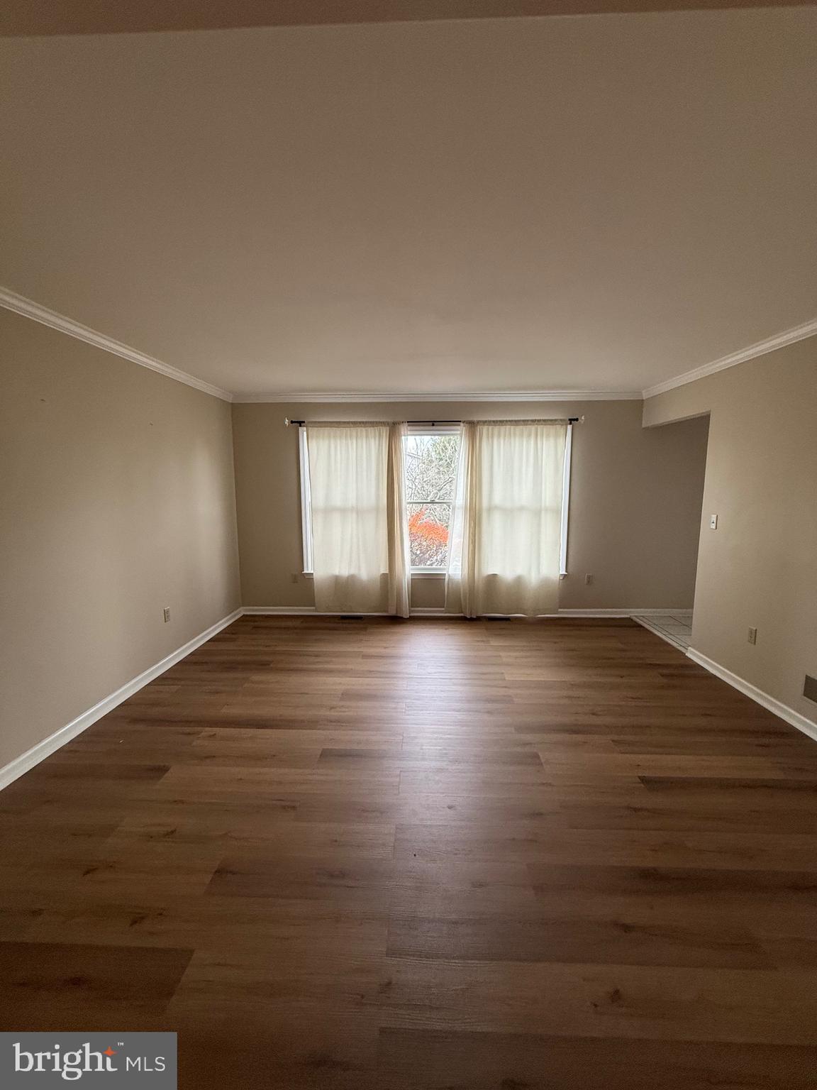 28 Willow Way Drive Enola, PA 17025 - Photo 5 of 22 an empty room with wooden floor and windows
