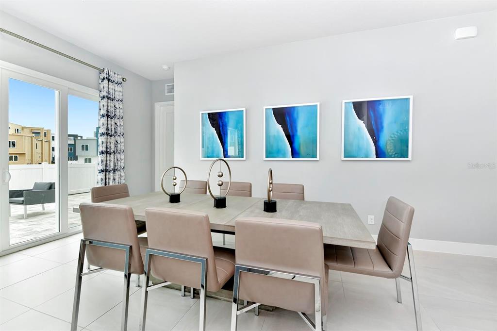 7770 Sandy Ridge Drive, Unit 135 Kissimmee, FL 34747 - Photo 16 of 43 a view of a dining room with furniture