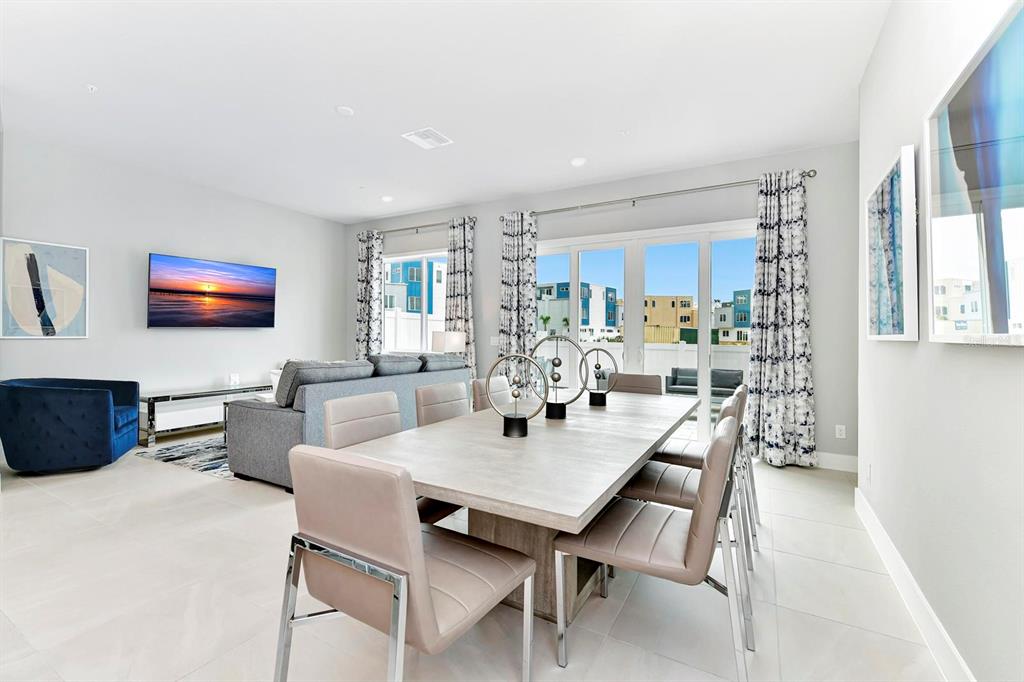 7770 Sandy Ridge Drive, Unit 135 Kissimmee, FL 34747 - Photo 18 of 43 a view of a dining room with furniture