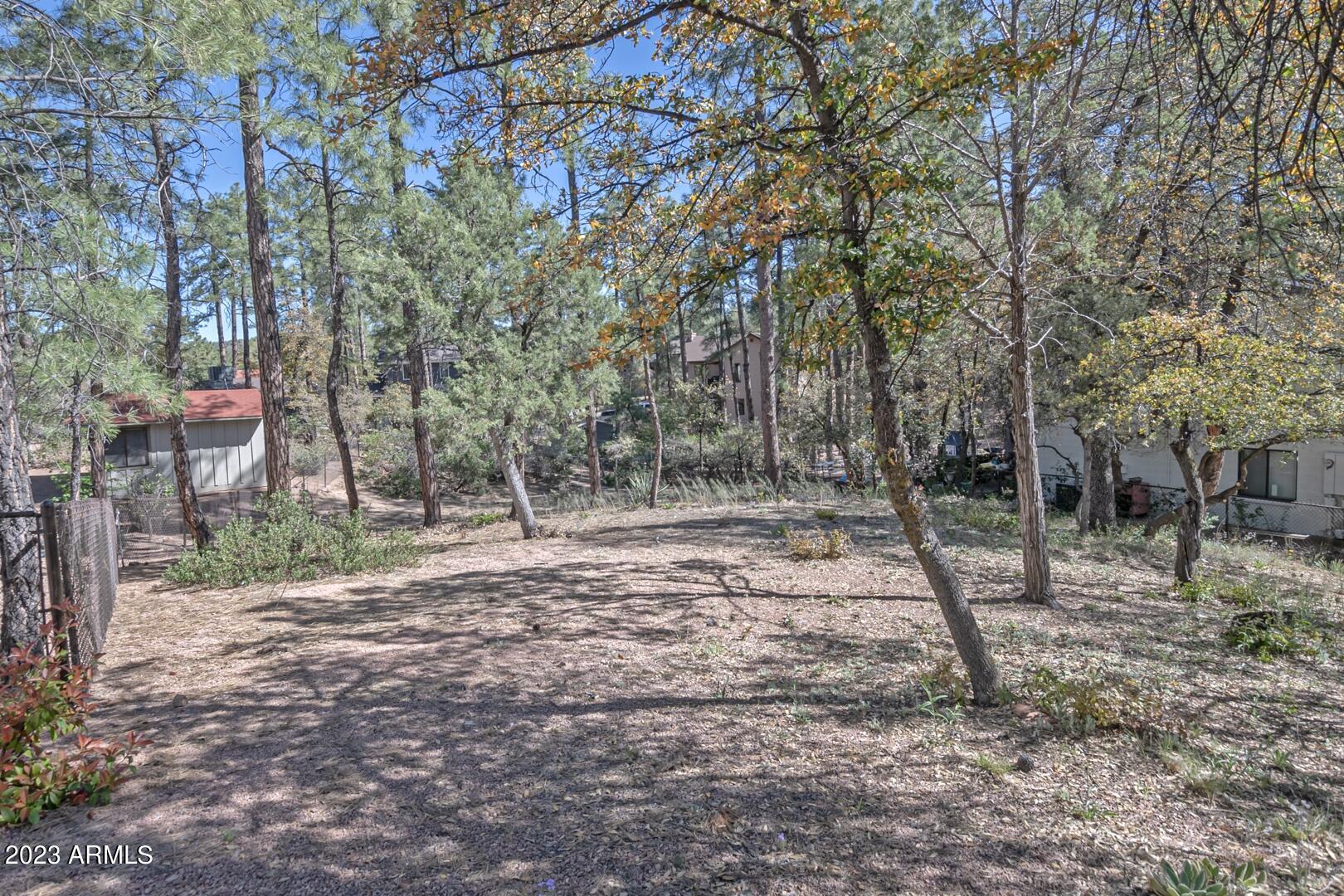 512 West Overland Road, Unit 83 Payson, AZ 85541 - Photo 11 of 33 a backyard of a house with lots of green space