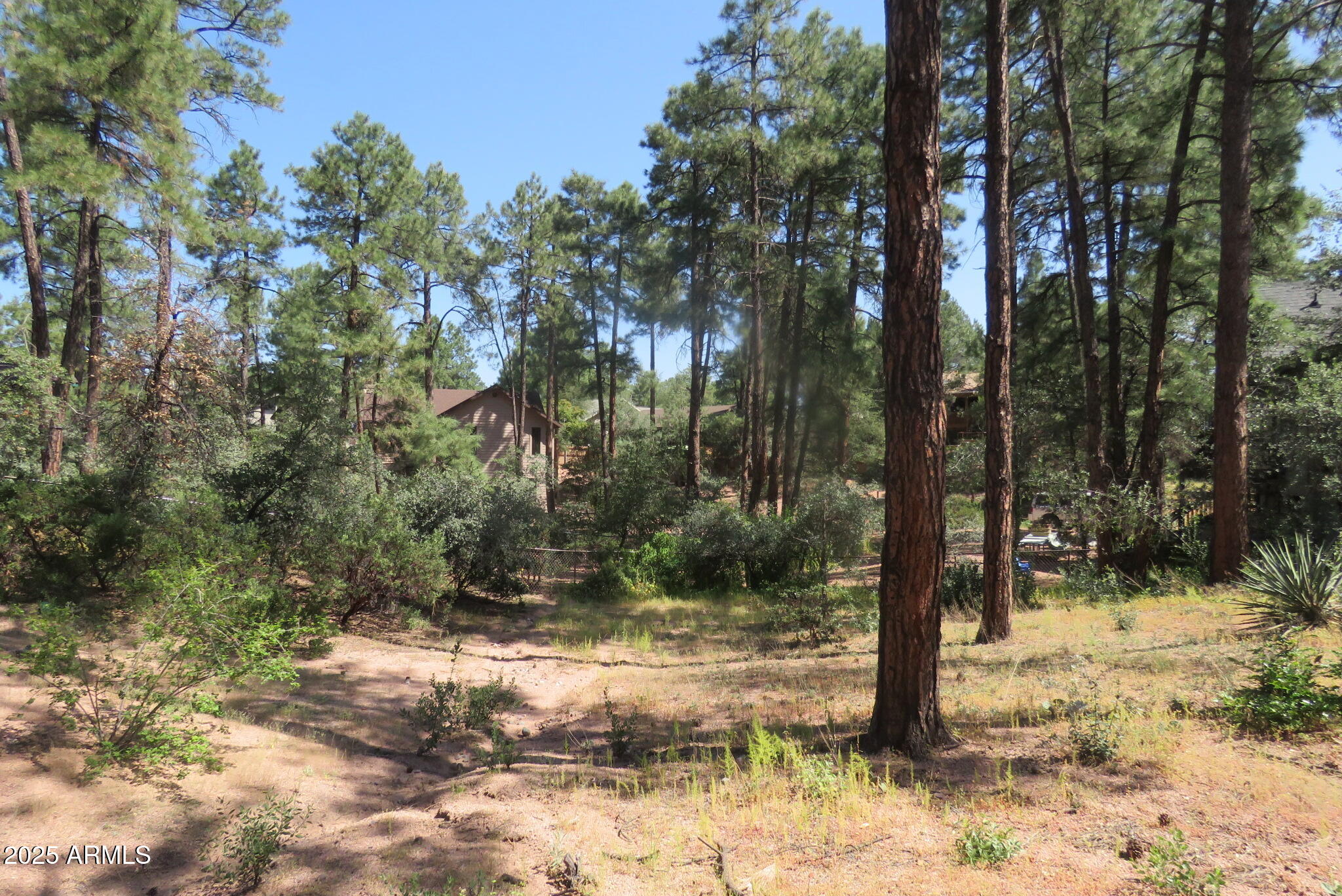 512 West Overland Road, Unit 83 Payson, AZ 85541 - Photo 22 of 33 a view of a yard covered with snow