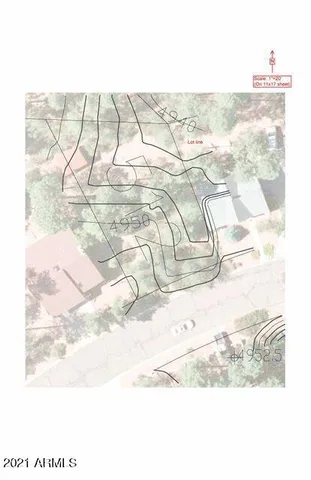 a view of a yard with a tree