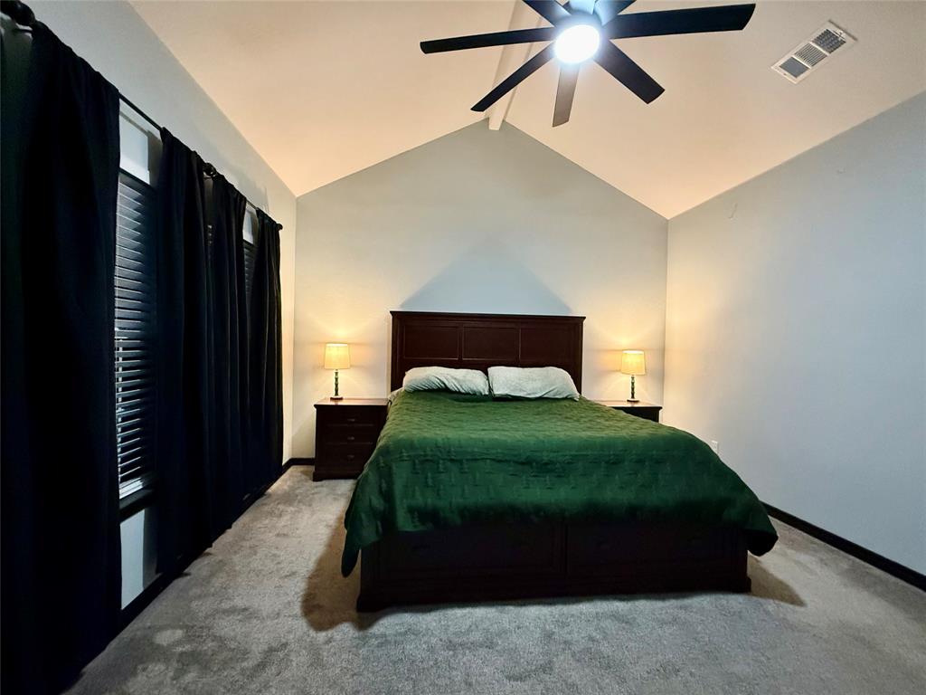 1384 County Road 1235 Point, TX 75472 - Photo 18 of 31 a bedroom with a bed and window