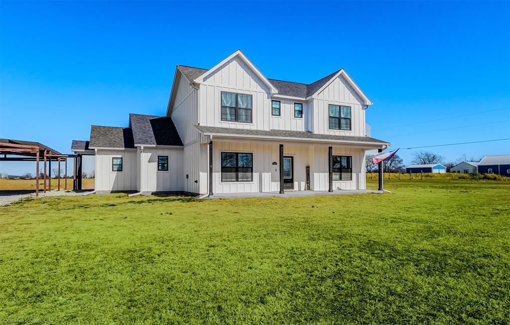 1384 County Road 1235 Point, TX 75472 - Photo 2 of 31 a front view of a house with a yard