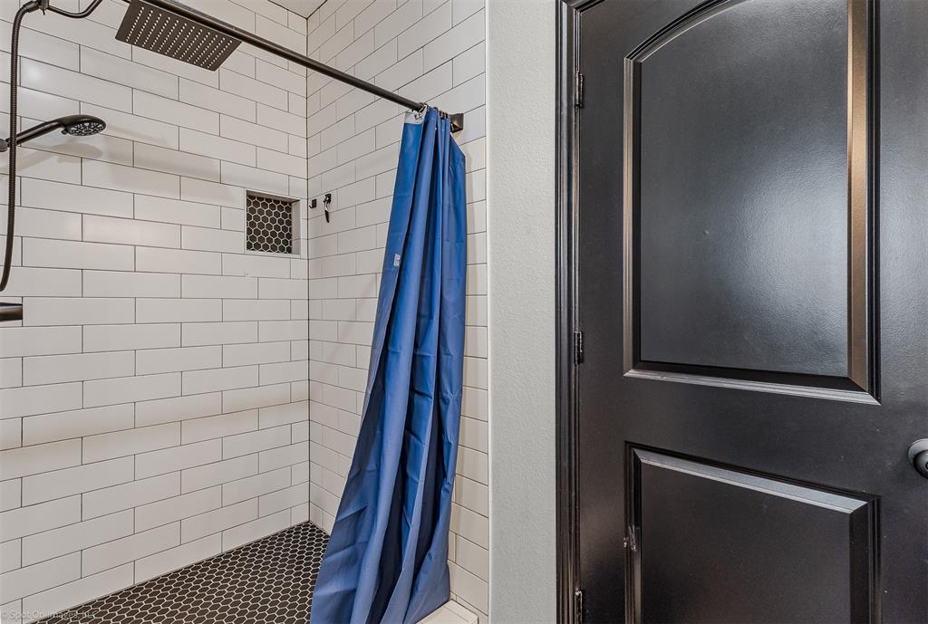 1384 County Road 1235 Point, TX 75472 - Photo 24 of 31 a bathroom with a shower and a sink