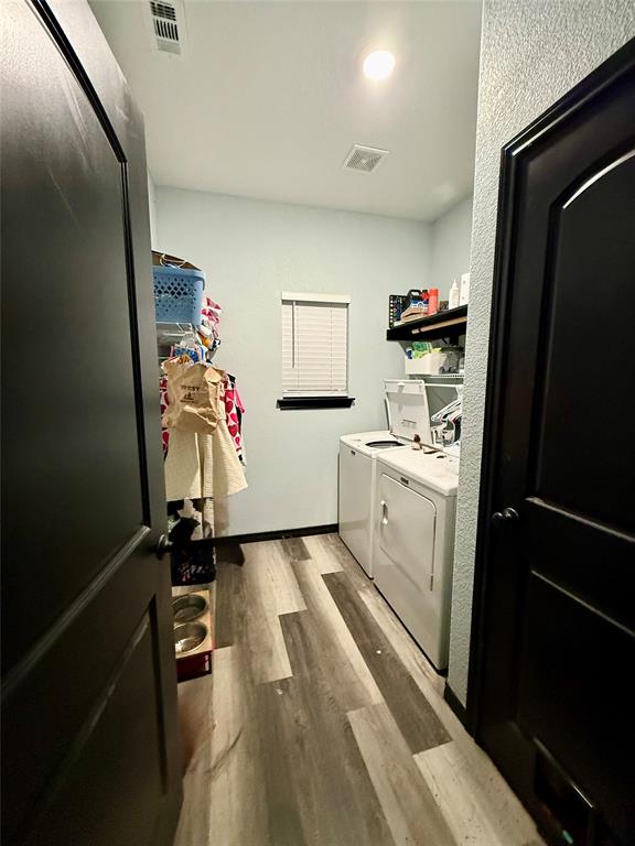 1384 County Road 1235 Point, TX 75472 - Photo 26 of 31 a view of a refrigerator and a sink in a kitchen