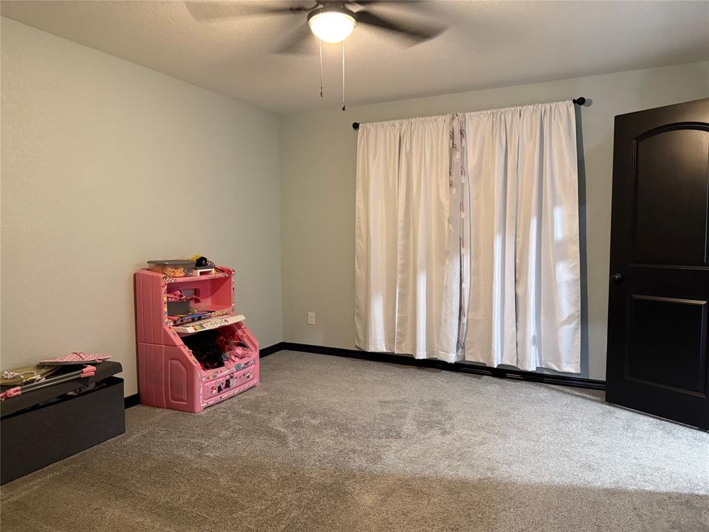 1384 County Road 1235 Point, TX 75472 - Photo 30 of 31 a room with toys and a window