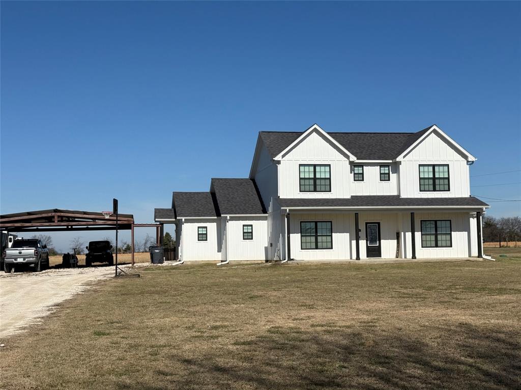 1384 County Road 1235 Point, TX 75472 - Photo 30 of 31 a car parked in front of a house