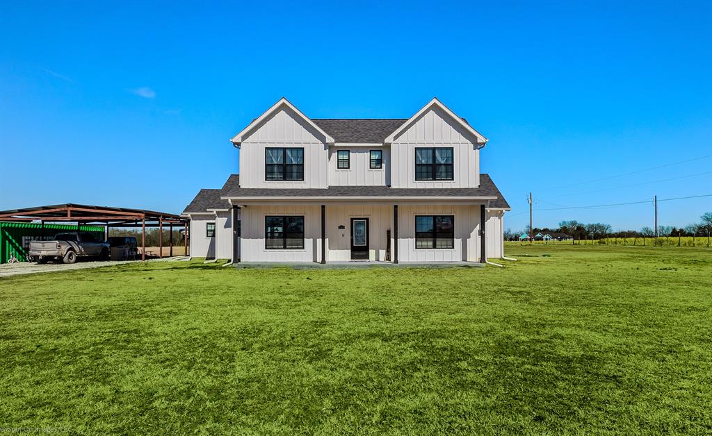 1384 County Road 1235 Point, TX 75472 - Photo 4 of 31 a view of house with garden and tall trees
