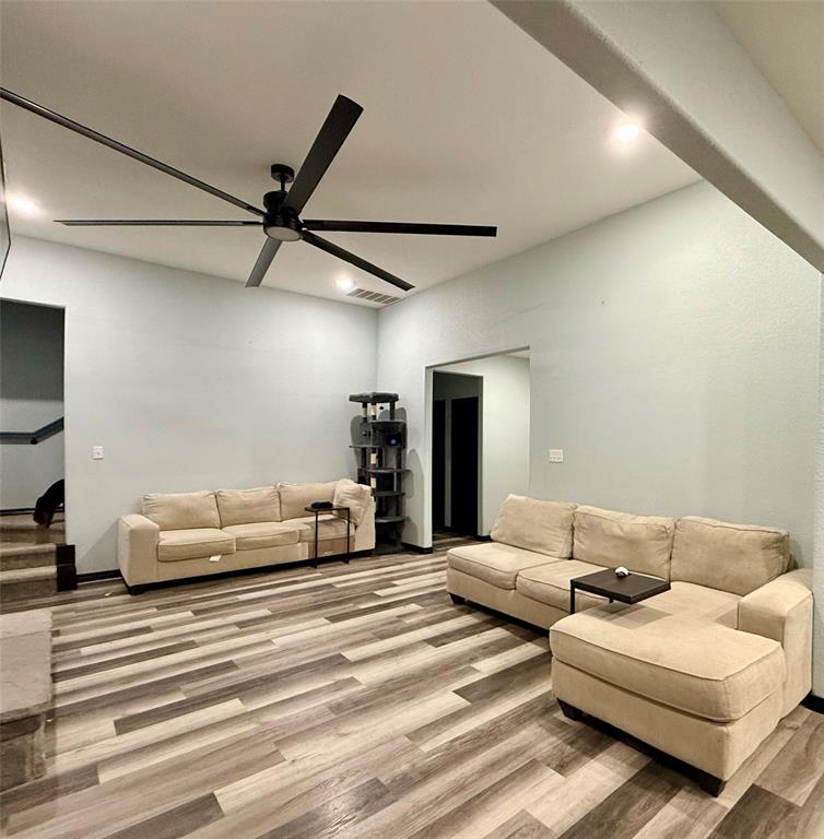 1384 County Road 1235 Point, TX 75472 - Photo 4 of 31 a bedroom with furniture and a ceiling fan