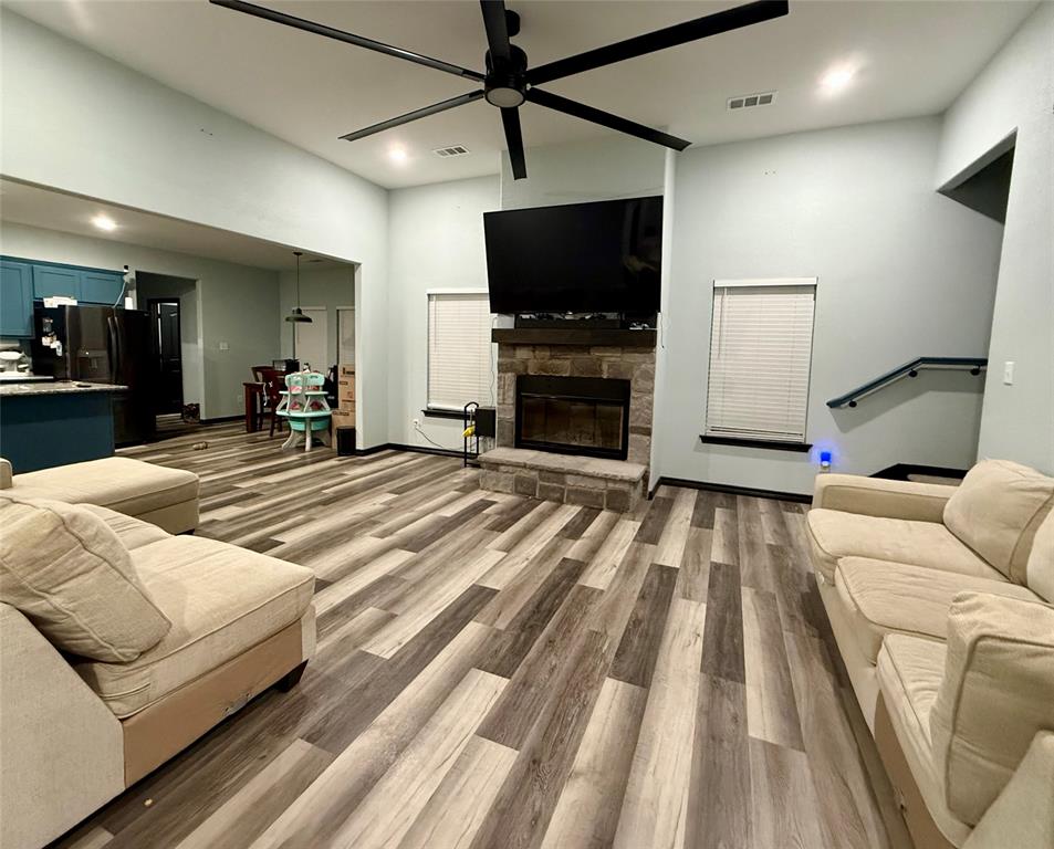 1384 County Road 1235 Point, TX 75472 - Photo 5 of 31 a living room with furniture and a flat screen tv
