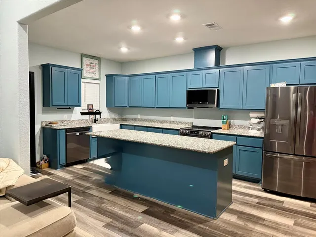 a room with storage and utility racks