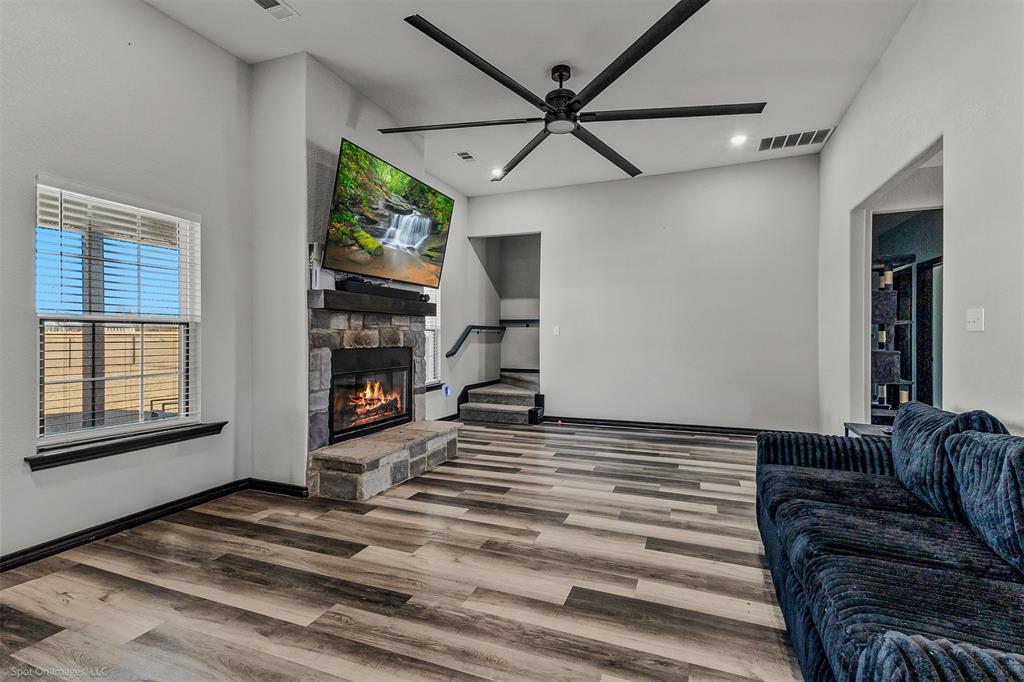1384 County Road 1235 Point, TX 75472 - Photo 8 of 31 a view of a livingroom with furniture and a ceiling fan