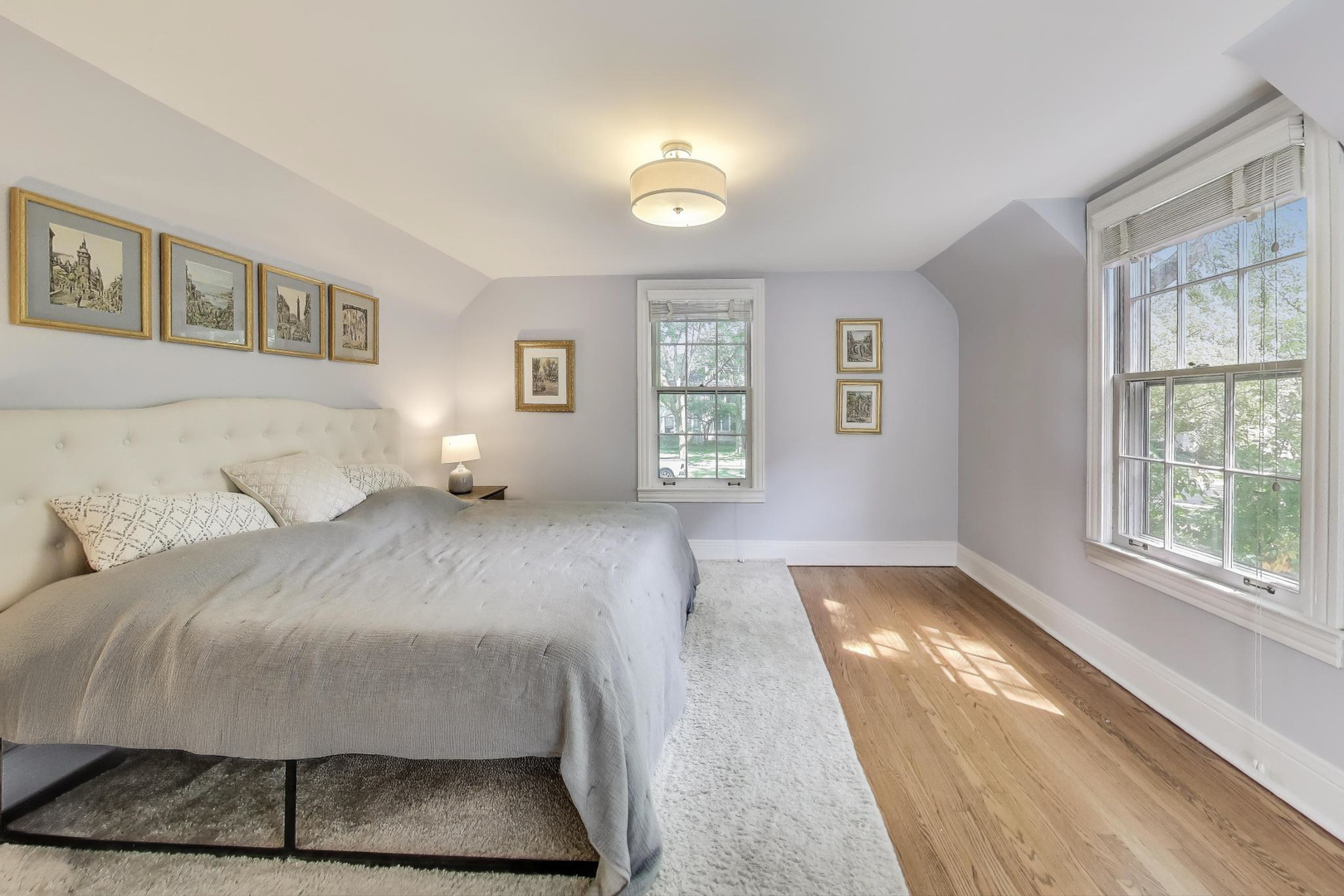 274 Ridge Avenue Winnetka, IL 60093 - Photo 15 of 36 a bedroom with a large bed and a window