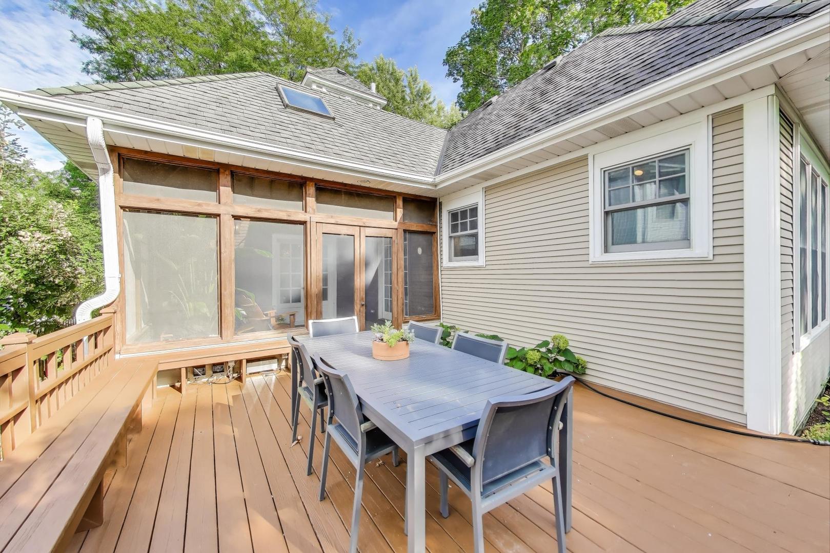 274 Ridge Avenue Winnetka, IL 60093 - Photo 29 of 36 a view of a patio with table and chairs and potted plants