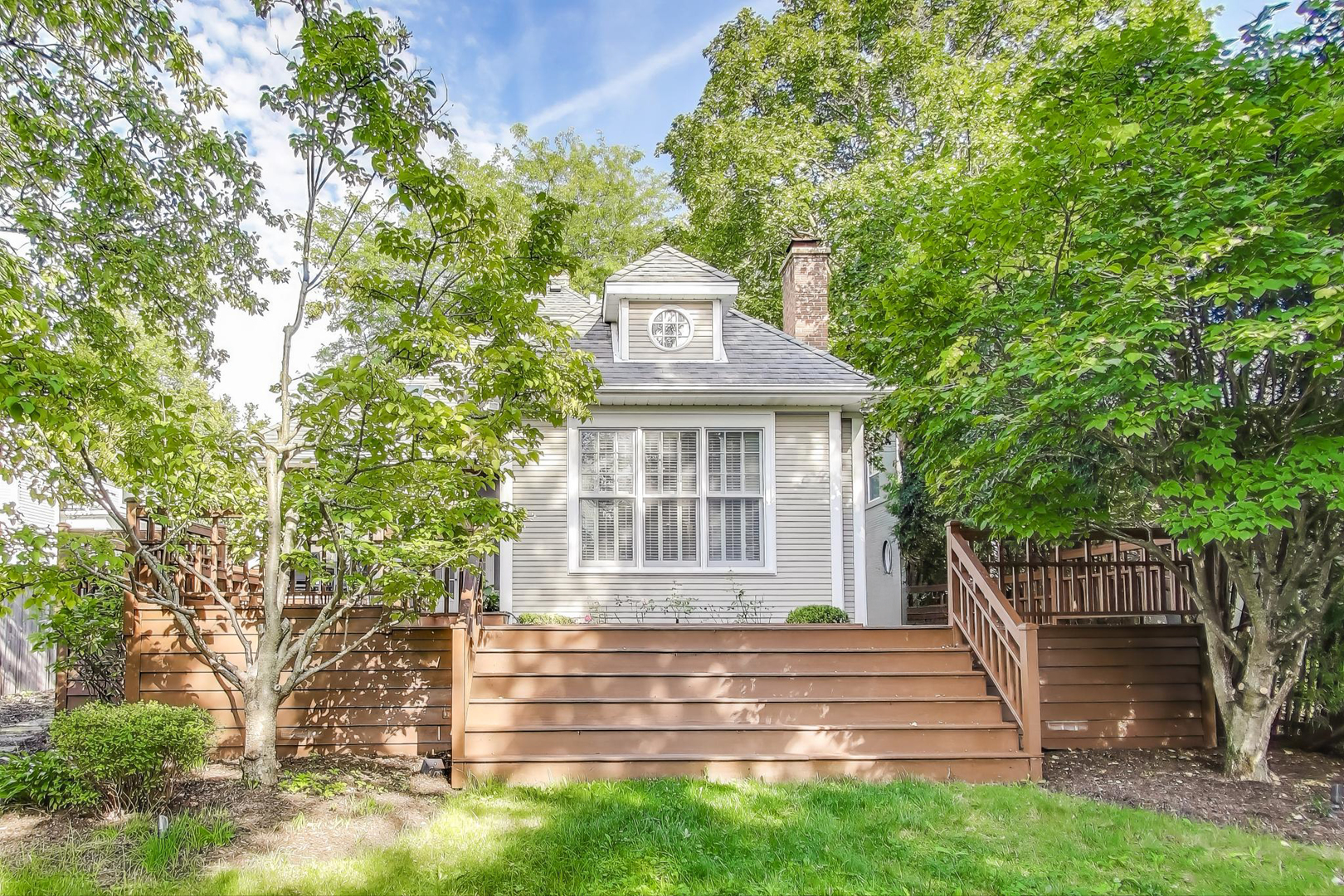 274 Ridge Avenue Winnetka, IL 60093 - Photo 31 of 36 a front view of a house with a garden