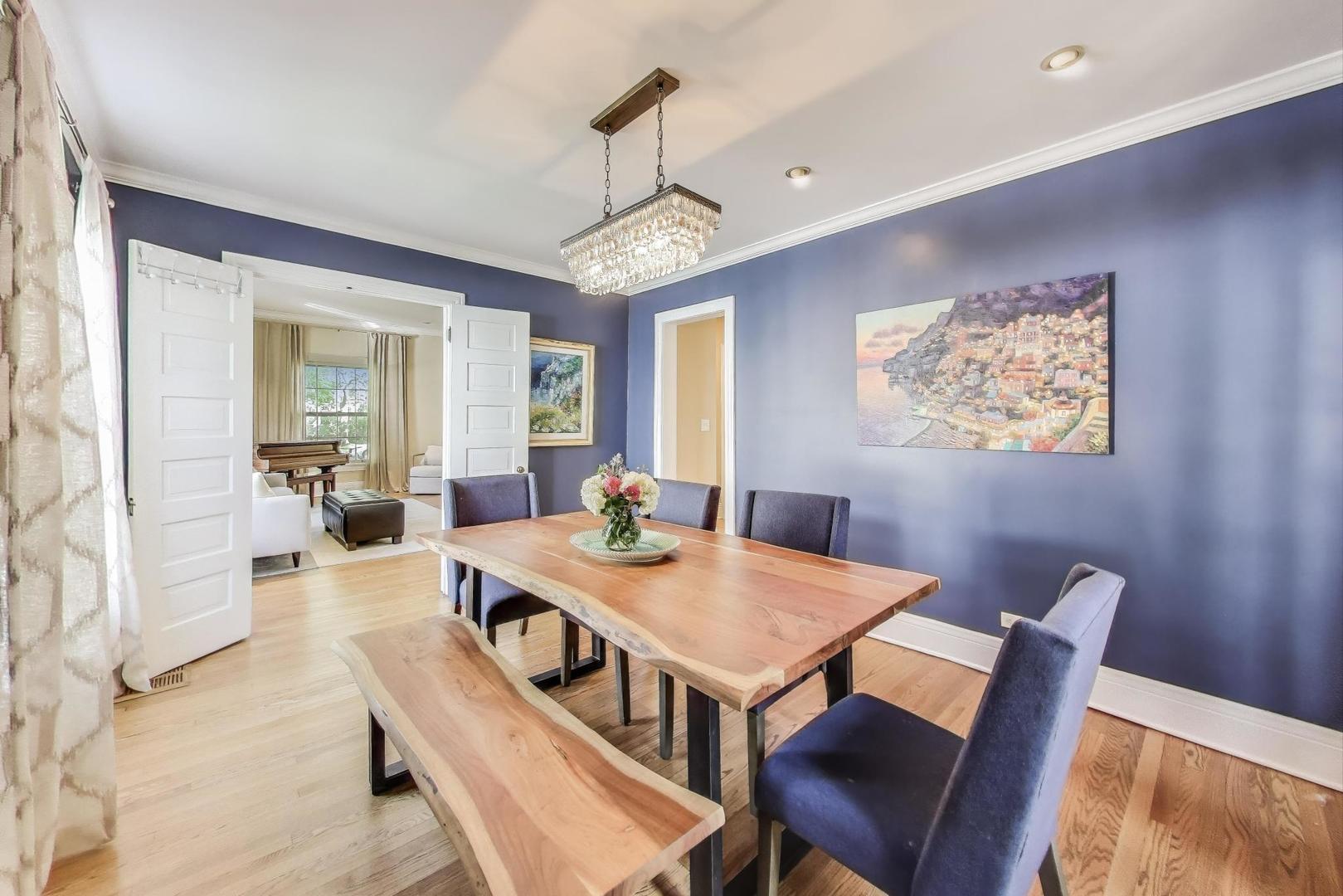 274 Ridge Avenue Winnetka, IL 60093 - Photo 6 of 36 a view of a dining room with furniture window and wooden floor