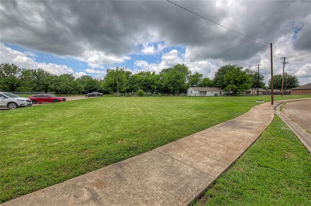 Tbd Washington Street Commerce, TX 75428 - Photo 13 of 13 a view of a park with large trees