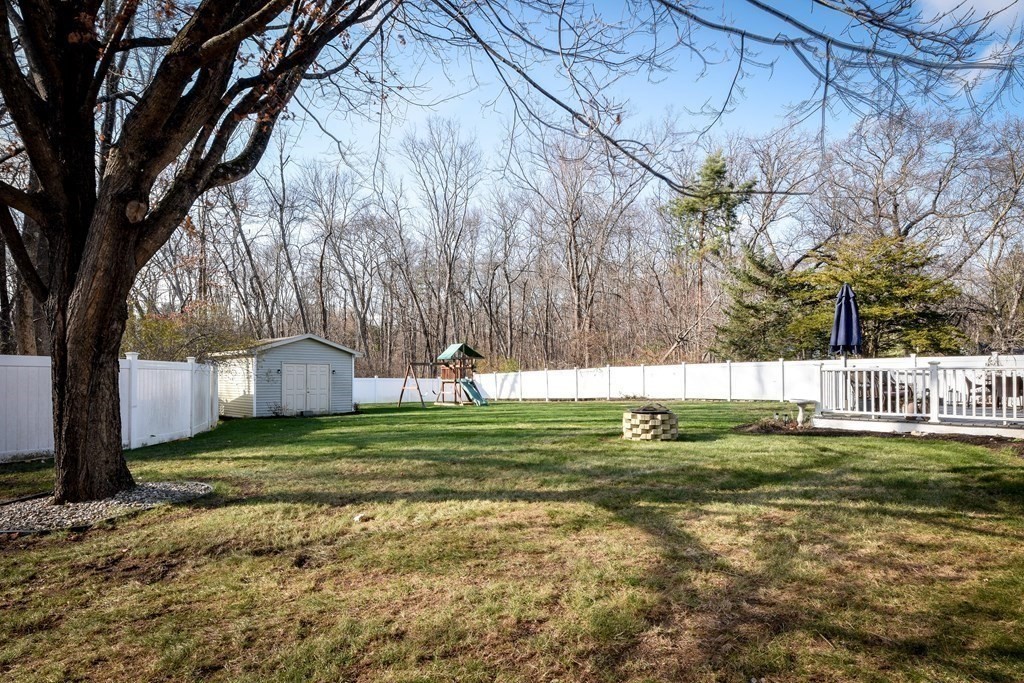 18 Raleigh Road Framingham, MA 01701 - Photo 2 of 18 a backyard of a house with lots of green space