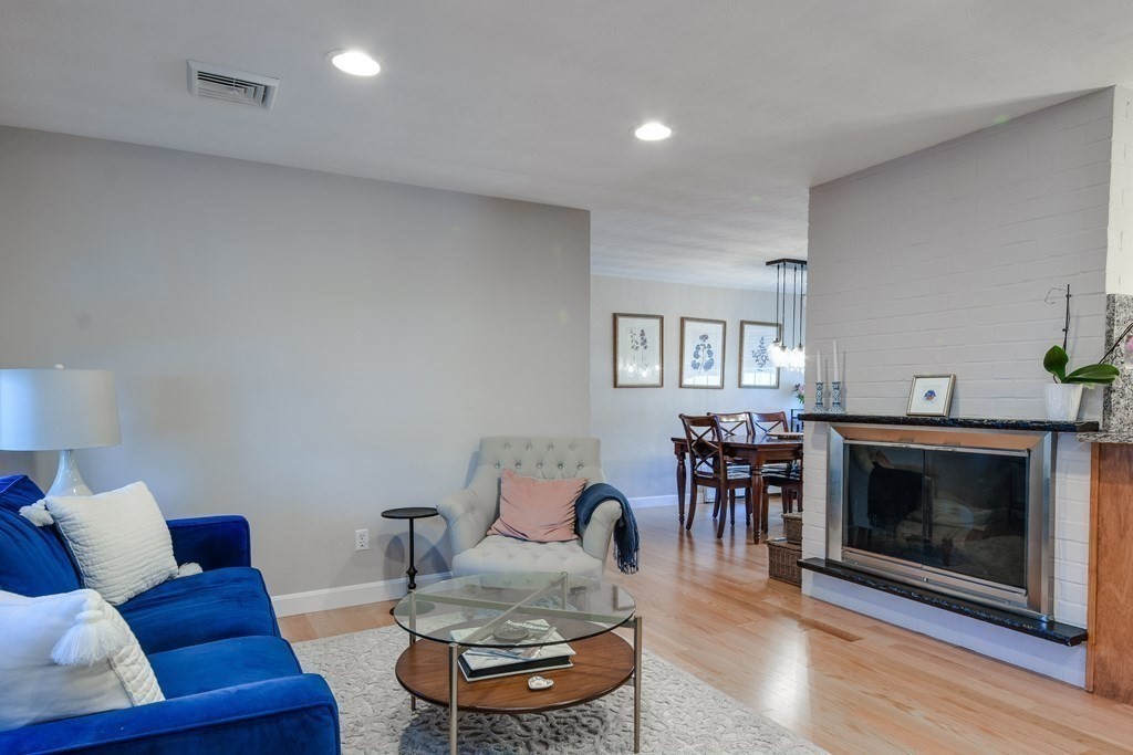 18 Raleigh Road Framingham, MA 01701 - Photo 5 of 18 a living room with furniture and a fireplace