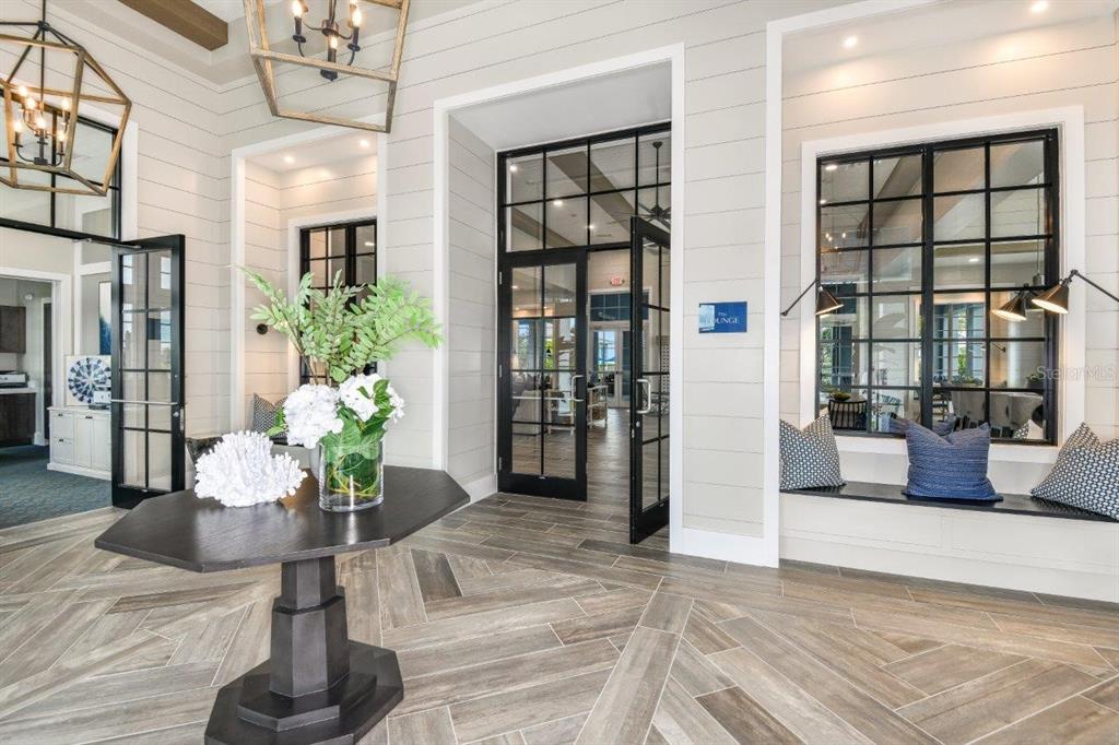 17923 Palmiste Drive Bradenton, FL 34202 - Photo 17 of 35 a view of a lobby with furniture and potted plant
