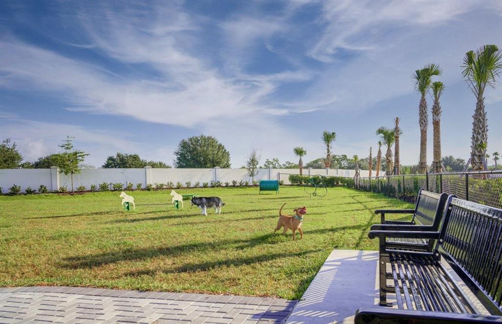 17923 Palmiste Drive Bradenton, FL 34202 - Photo 34 of 35 a view of a golf course with a deck