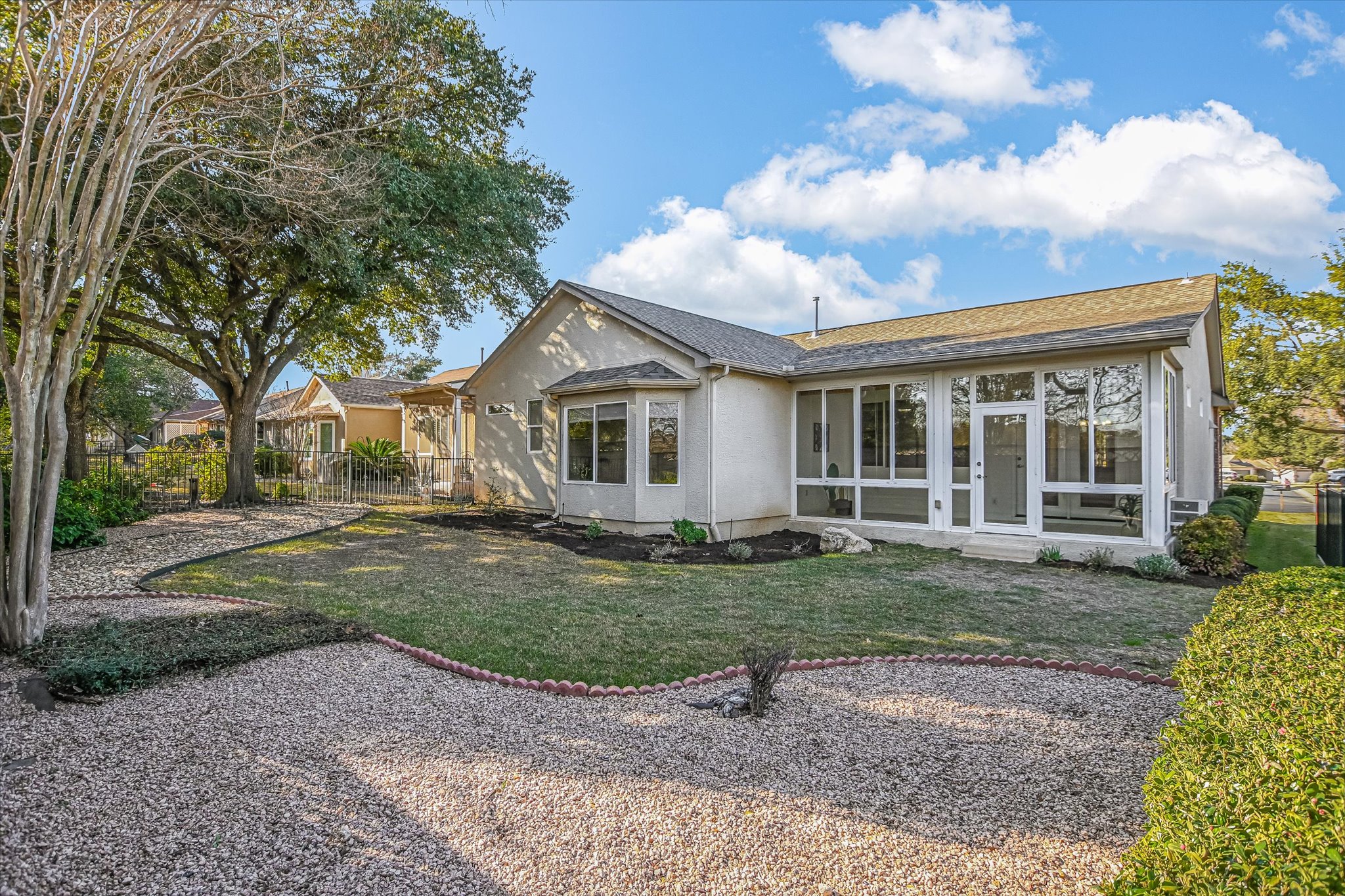265 Trail Of The Flowers Georgetown, TX 78633 - Photo 19 of 20 a view of a house with a yard