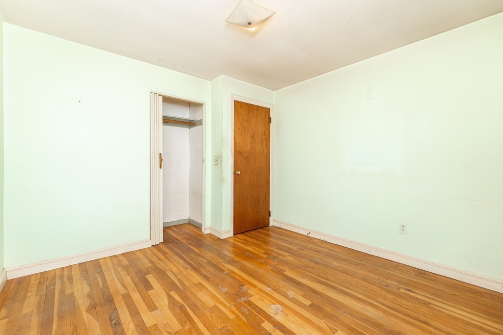 51 Pincushion Road Framingham, MA 01702 - Photo 15 of 42 a view of a big room with wooden floor