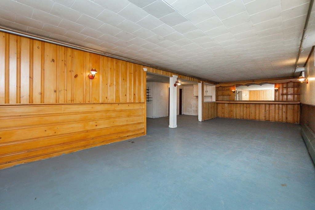 51 Pincushion Road Framingham, MA 01702 - Photo 23 of 42 a view of a room with an empty space and a window
