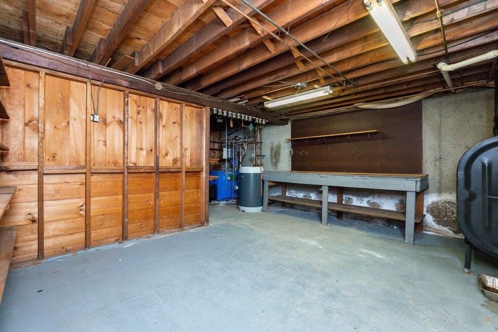 51 Pincushion Road Framingham, MA 01702 - Photo 26 of 42 a view of an empty room with a tv