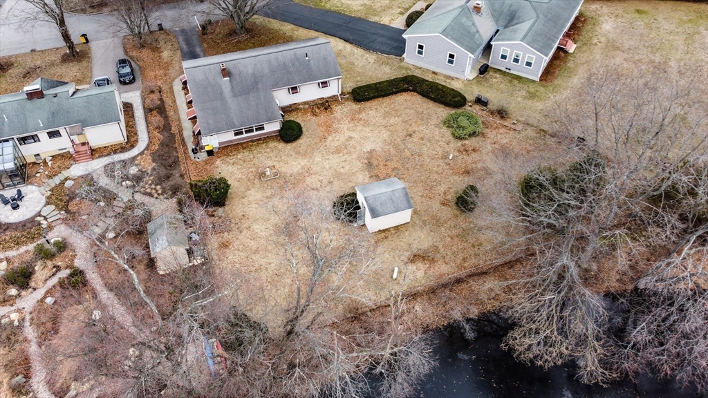 51 Pincushion Road Framingham, MA 01702 - Photo 38 of 42 an aerial view of residential houses with outdoor space