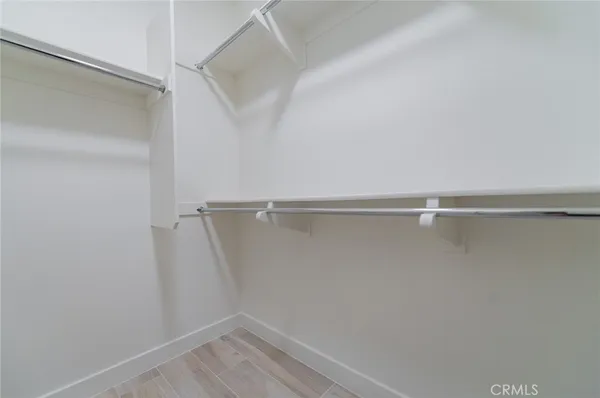 a view of an empty walk in closet