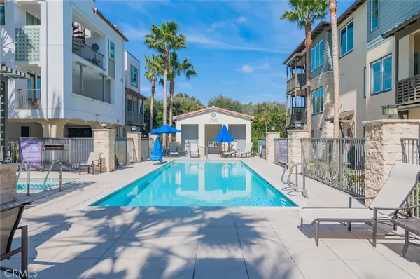 a view of a swimming pool with a patio