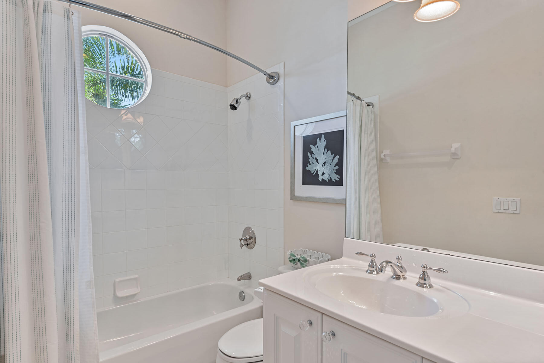 9110 Cascada Way, Unit 201 Naples, FL 34114 - Photo 18 of 50 a bathroom with a sink toilet and shower