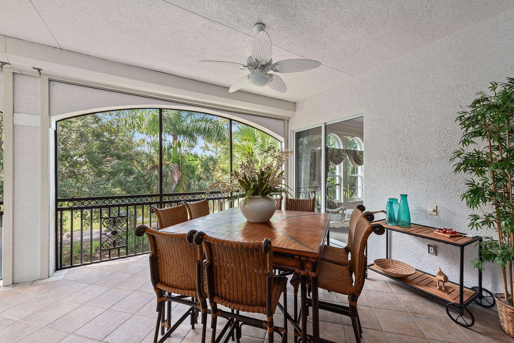 9110 Cascada Way, Unit 201 Naples, FL 34114 - Photo 23 of 50 a dining room with furniture window and outside view