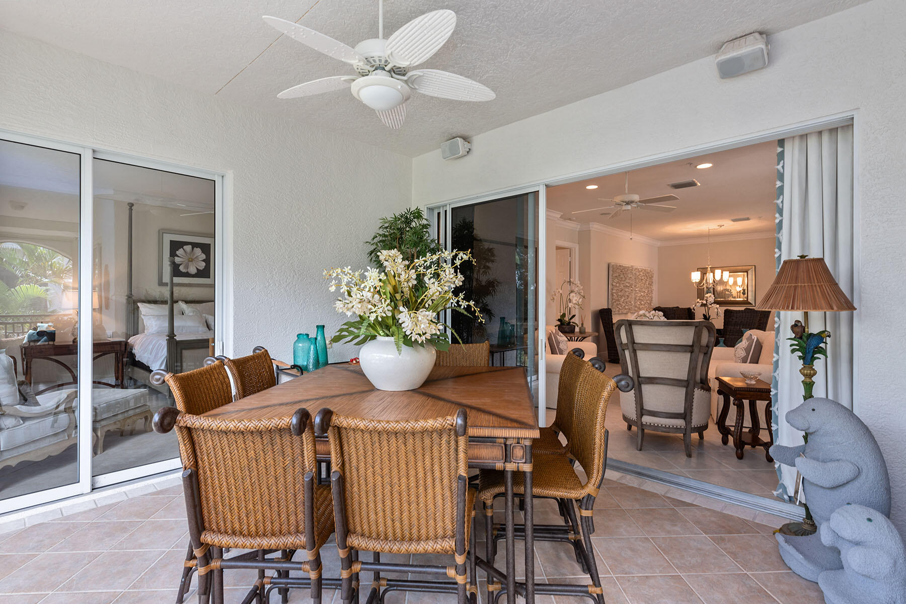 9110 Cascada Way, Unit 201 Naples, FL 34114 - Photo 26 of 50 a view of a dining room with furniture and chandelier