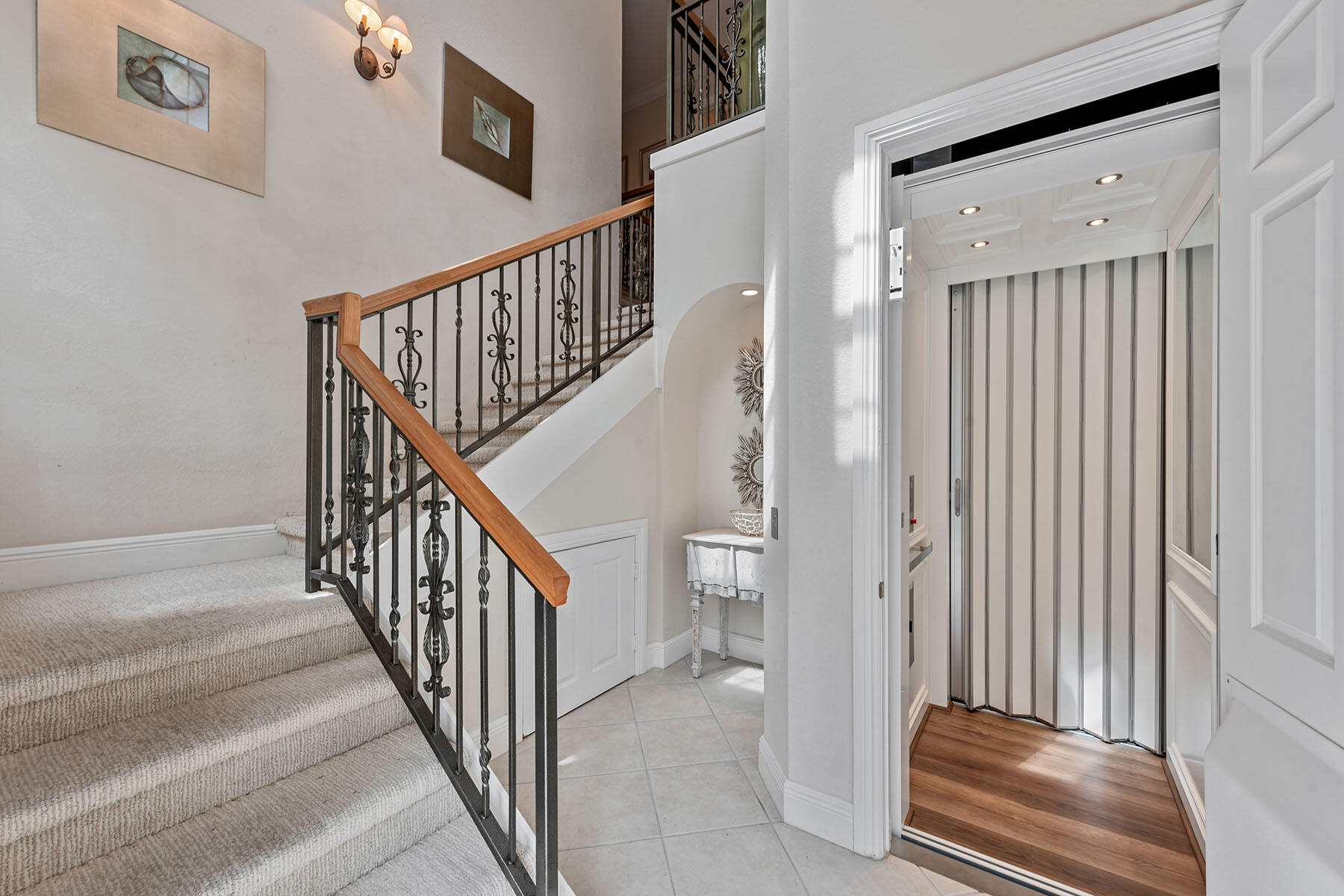 9110 Cascada Way, Unit 201 Naples, FL 34114 - Photo 28 of 50 a view of a hallway with staircase