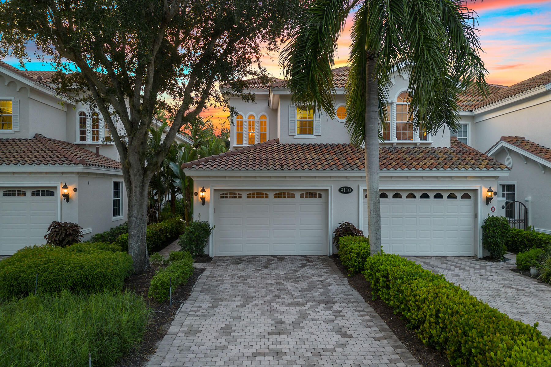 9110 Cascada Way, Unit 201 Naples, FL 34114 - Photo 34 of 50 a house view with a garden space