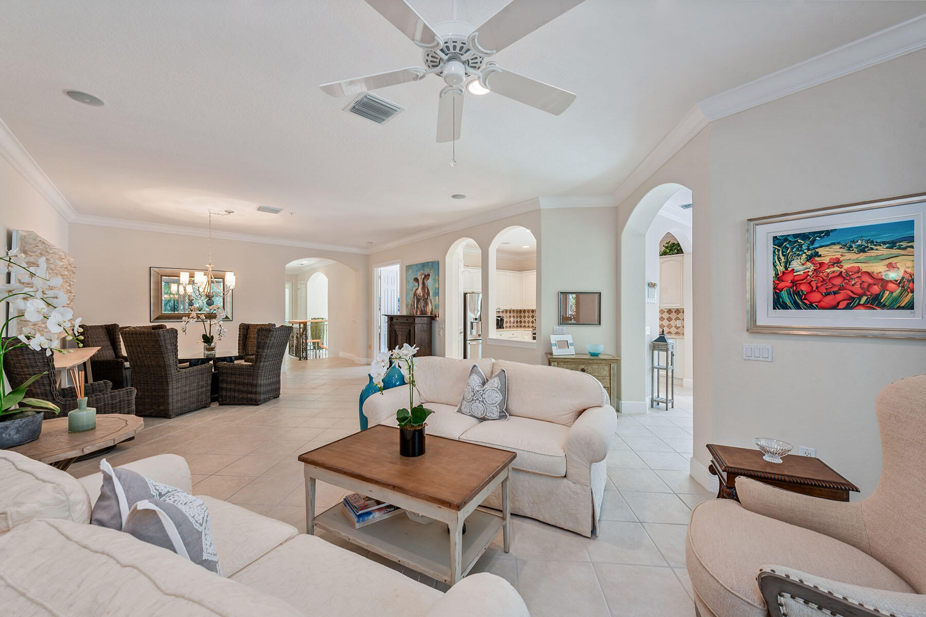 9110 Cascada Way, Unit 201 Naples, FL 34114 - Photo 5 of 50 a living room with furniture and wooden floor