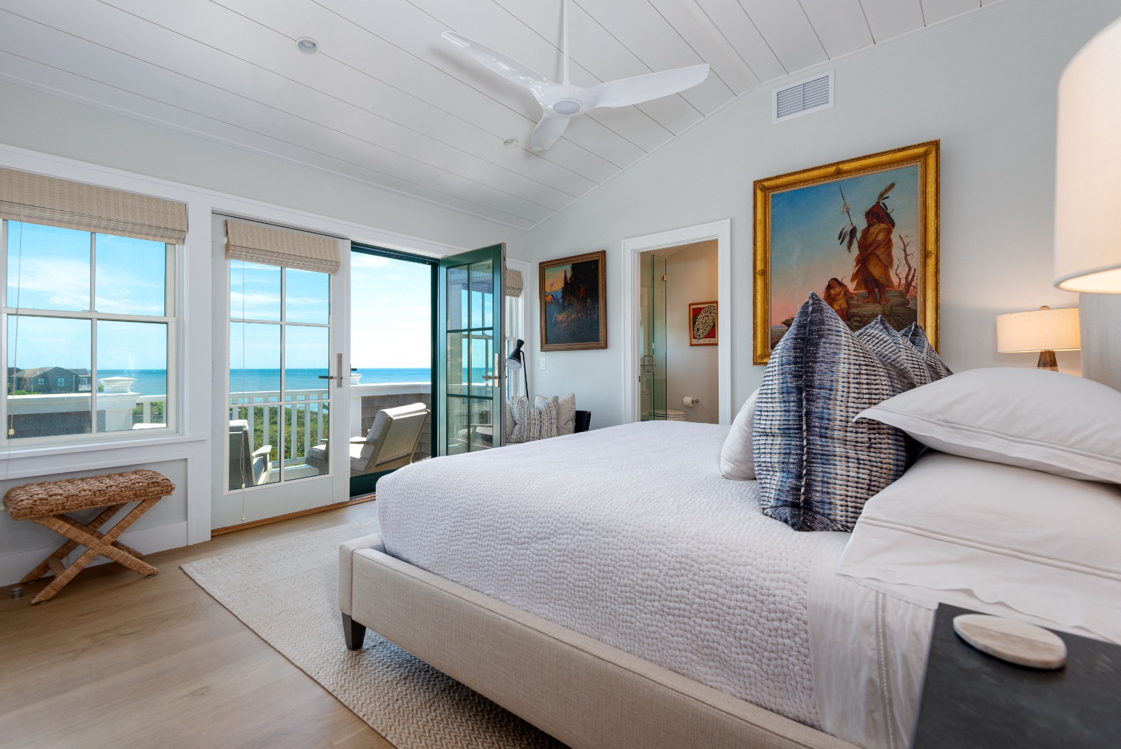 34 Bosworth Road Nantucket, MA 02554 - Photo 33 of 38 a bedroom with a large bed and a large window
