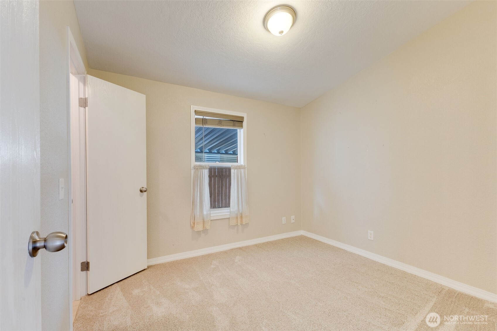 10420 197th Street East Graham, WA 98338 - Photo 15 of 21 an empty room with windows