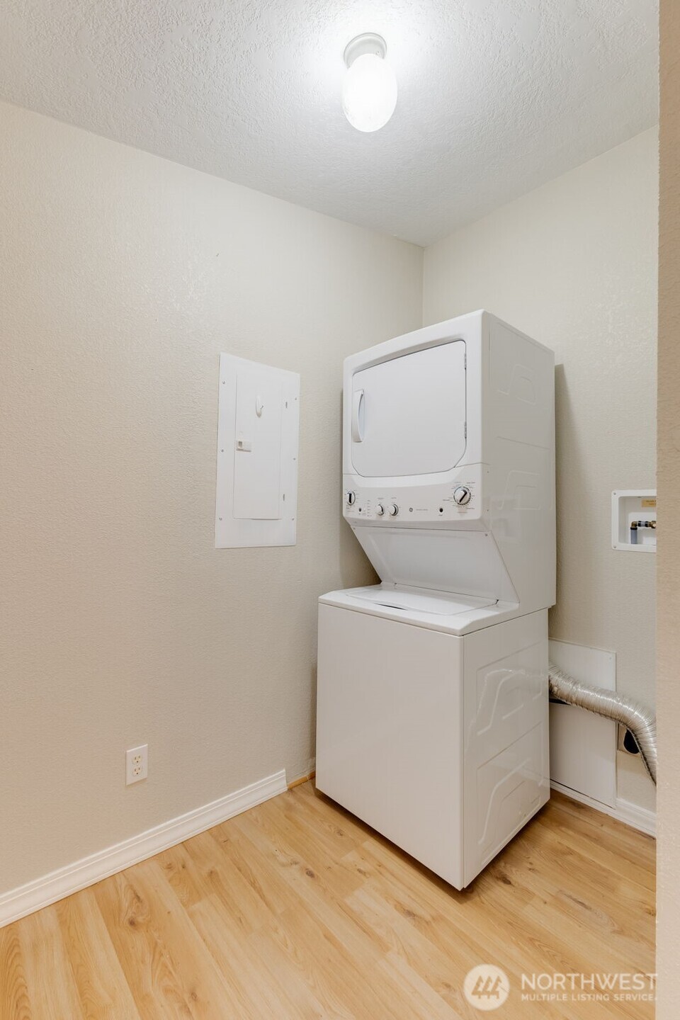 10420 197th Street East Graham, WA 98338 - Photo 18 of 21 a room with a bed and cabinets