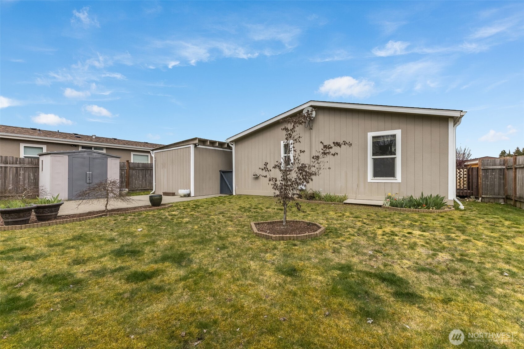 10420 197th Street East Graham, WA 98338 - Photo 21 of 21 a view of a house with backyard and garden