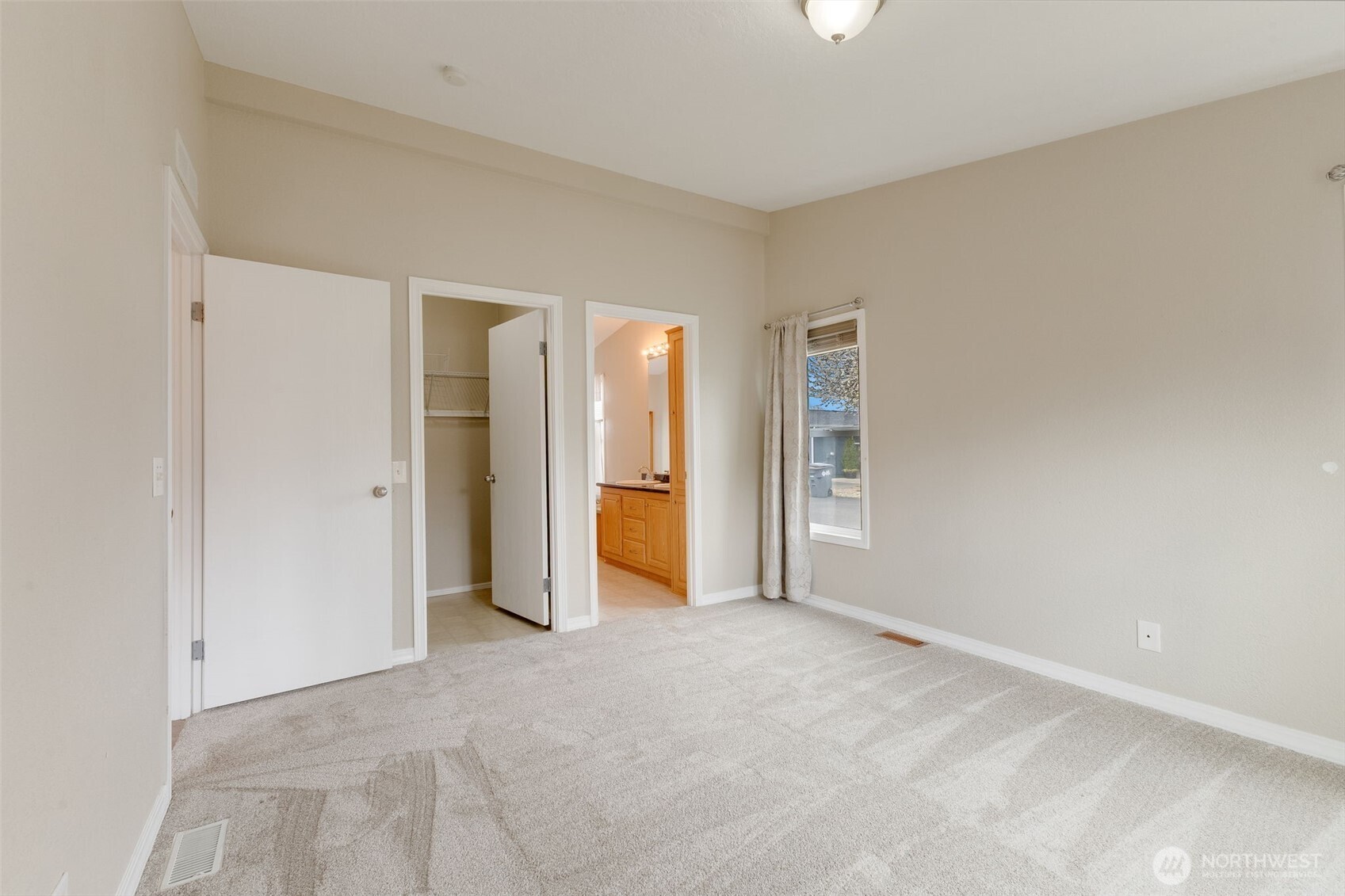 10420 197th Street East Graham, WA 98338 - Photo 10 of 21 a view of an empty room with a window