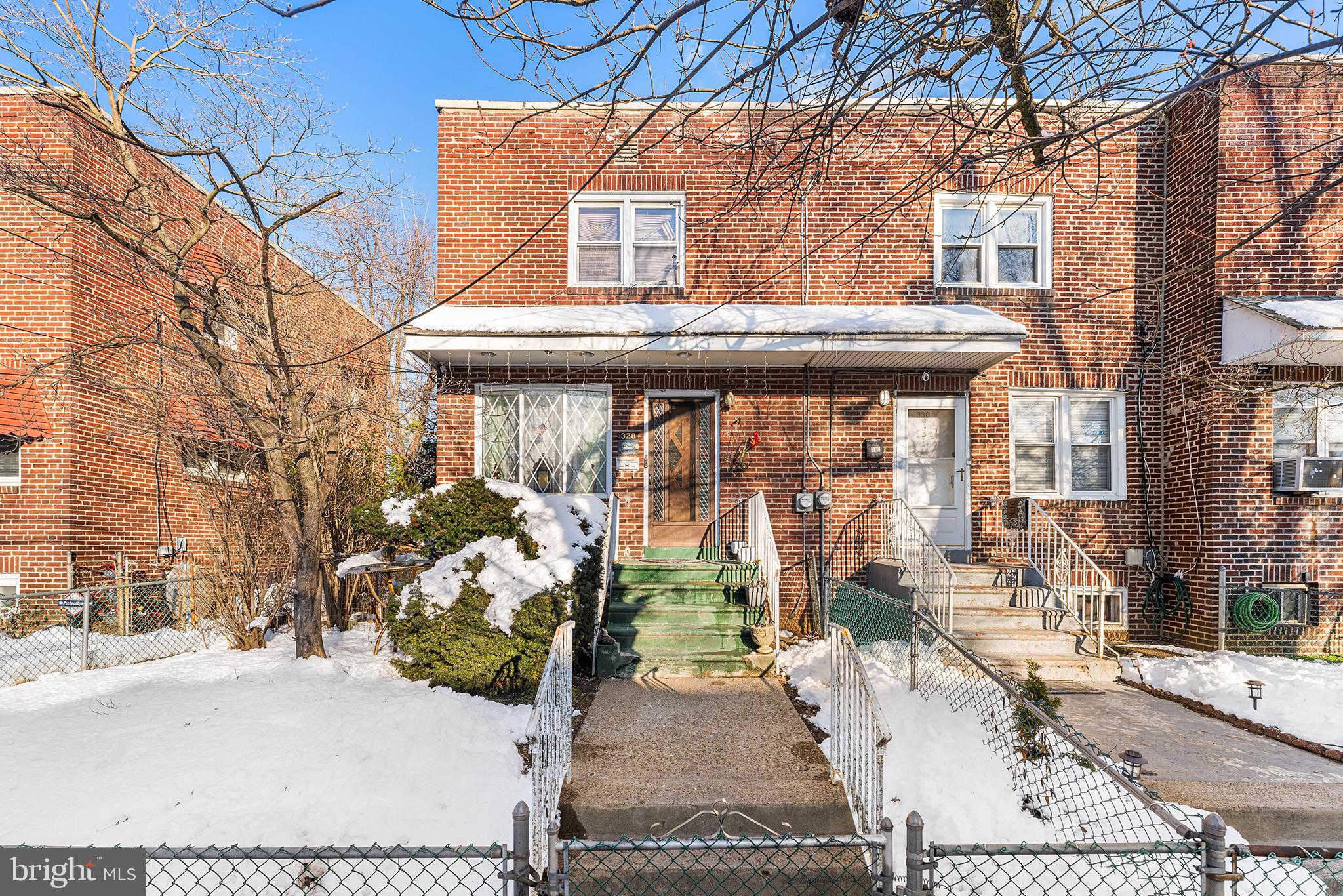 a view of a house with large windows
