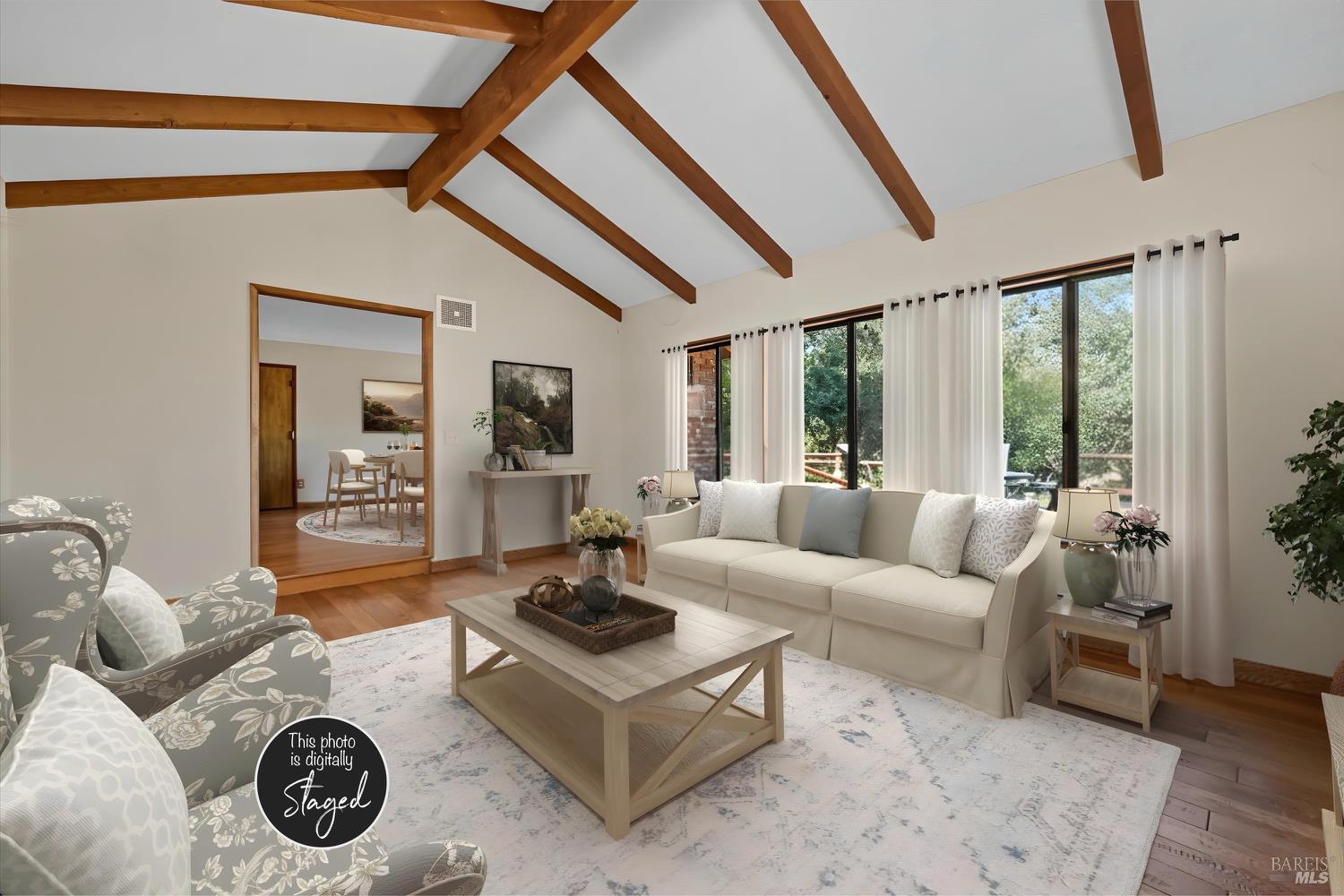 2487 Olivet Road Santa Rosa, CA 95401 - Photo 12 of 45 a living room with furniture a rug and a large window